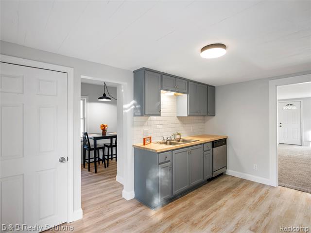 Builiding view five for 309 School, Almont, MI. 48003