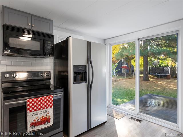 Builiding view seven for 309 School, Almont, MI. 48003