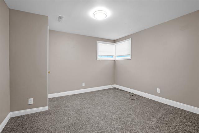 Builiding view eighteen for 1165 Elms, Flint, MI. 48532