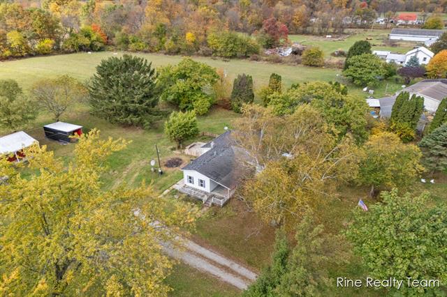 Builiding view seventeen for 876 Briggs Rd, Quincy, MI. 49082