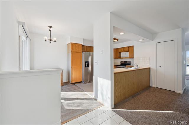 Builiding view five for 9836 Hawthorne Glen, Grosse Ile, MI. 48138