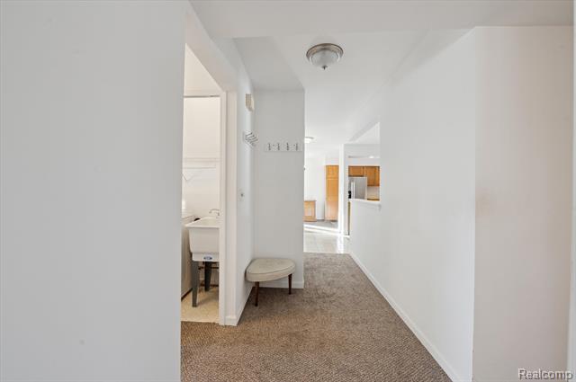 Builiding view ten for 9836 Hawthorne Glen, Grosse Ile, MI. 48138