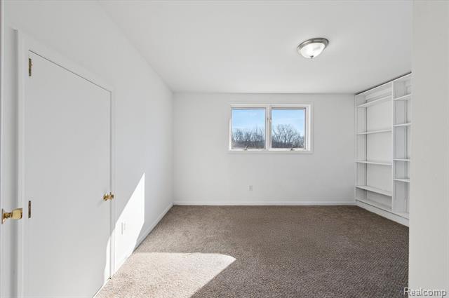 Builiding view twenty two for 9836 Hawthorne Glen, Grosse Ile, MI. 48138