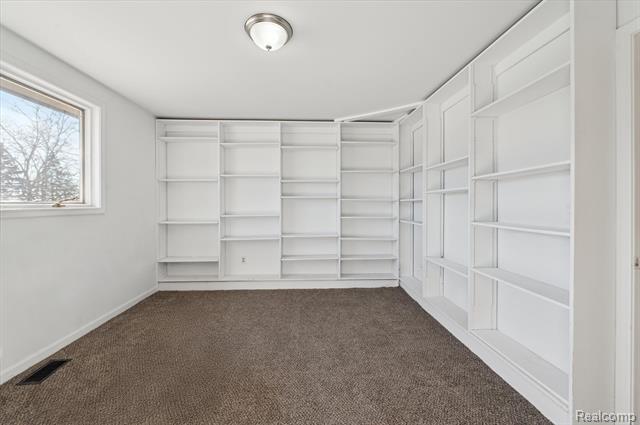 Builiding view twenty for 9836 Hawthorne Glen, Grosse Ile, MI. 48138