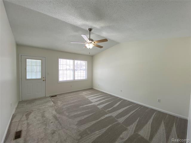 Builiding view three for 596 Yorkshire Sq, Milan, MI. 48160