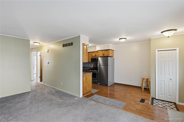 Builiding view four for 49990 Helfer, Wixom, MI. 48393