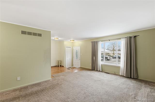 Builiding view one for 49990 Helfer, Wixom, MI. 48393