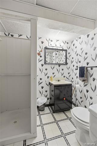 Builiding view sixteen for 49990 Helfer, Wixom, MI. 48393