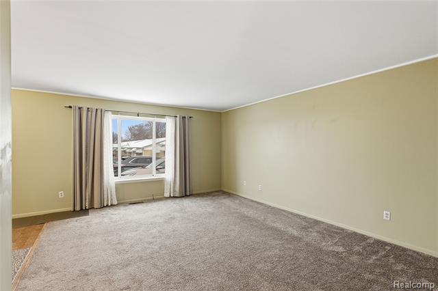 Builiding view three for 49990 Helfer, Wixom, MI. 48393