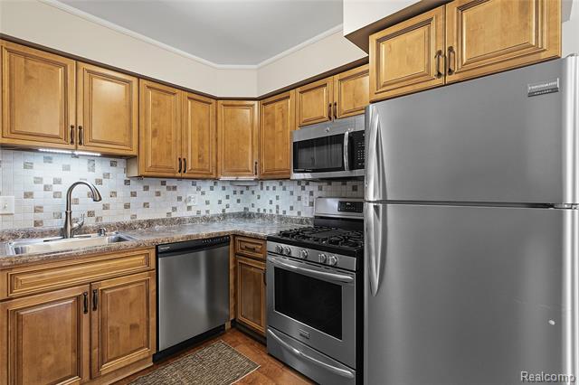 Builiding view two for 49990 Helfer, Wixom, MI. 48393