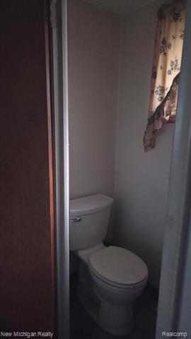 Builiding view fifteen for 420 Maple, Webberville, MI. 48892