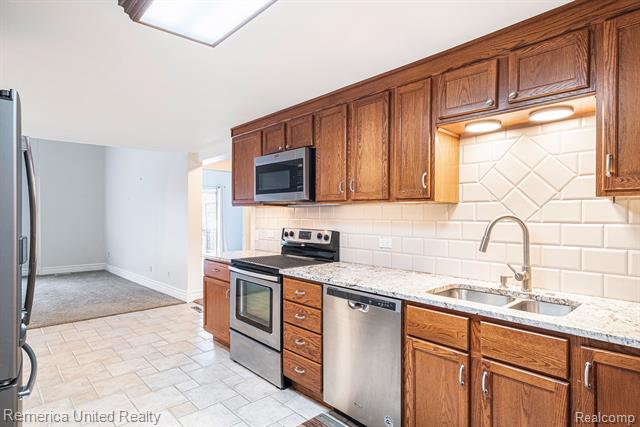 Builiding view four for 12237 Dalhart, Fenton, MI. 48430