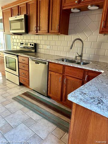 Builiding view six for 12237 Dalhart, Fenton, MI. 48430