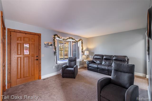 Builiding view five for 731 Cherry Hill, Columbiaville, MI. 48421