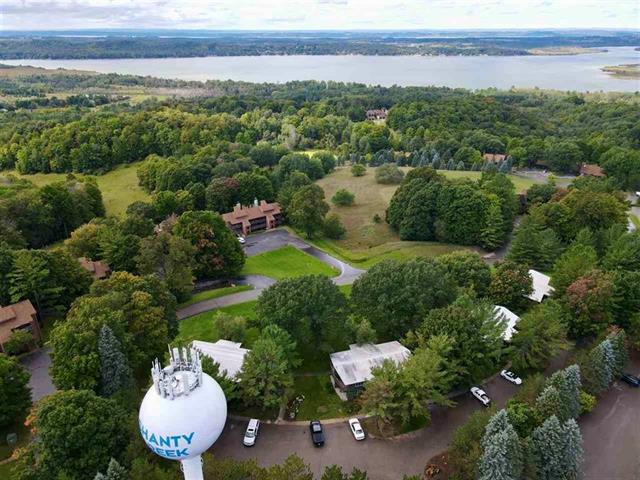 Builiding view three for 5712 Shanty Creek Road, Bellaire, MI. 49615