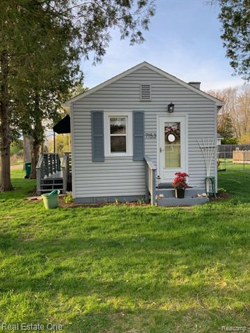 Builiding view thirty four for 7153 Cedar, Lexington, MI. 48450