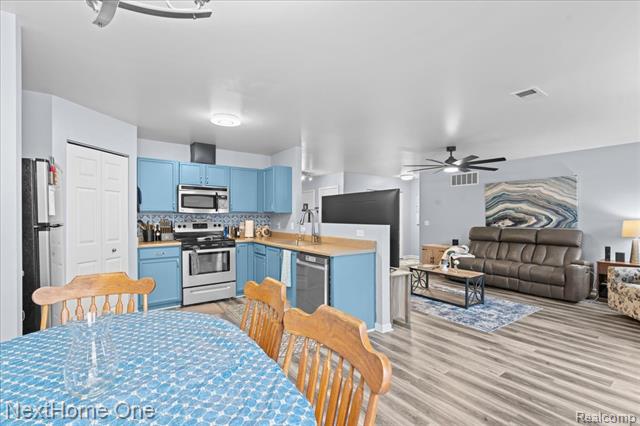 Builiding view nine for 8564 Fox River, Fowlerville, MI. 48836