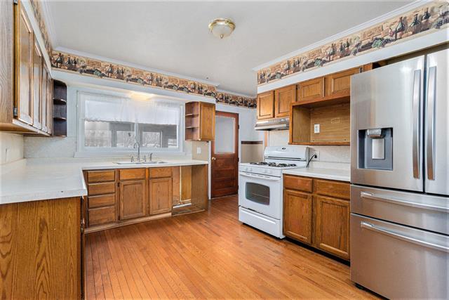 Builiding view three for 116 24Th, Battle Creek, MI. 49015