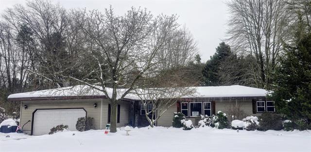 front view for 6340 S Quarterline Road, Spring Lake, Mi. 49456