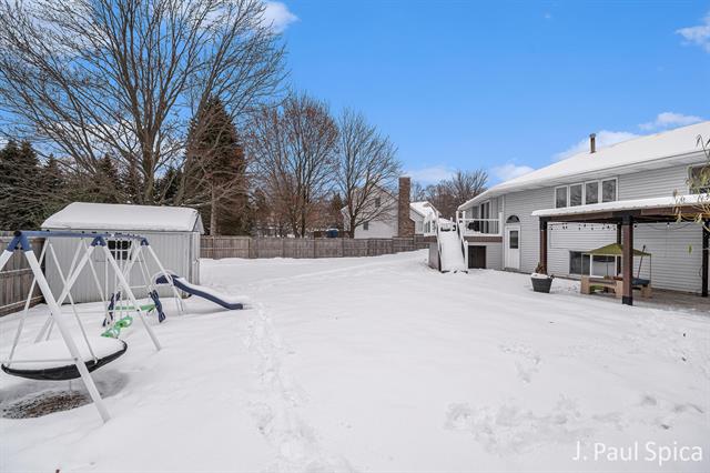 Builiding view thirty for 4127 Chaminade, Grandville, MI. 49418