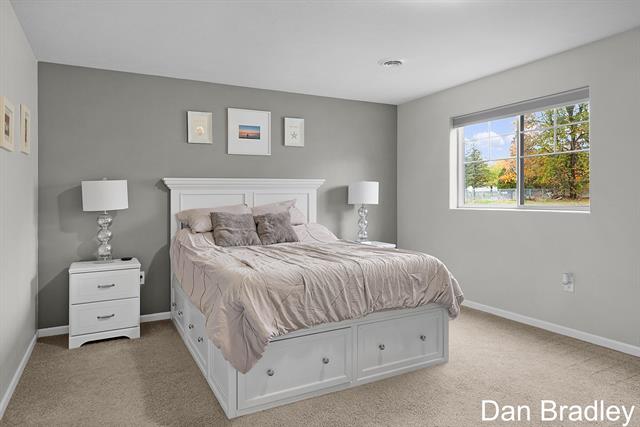 Builiding view eighteen for 448 Tentree, Sparta, MI. 49345