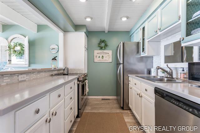 Builiding view eleven for 566 Wind Drift, Spring Lake, MI. 49456