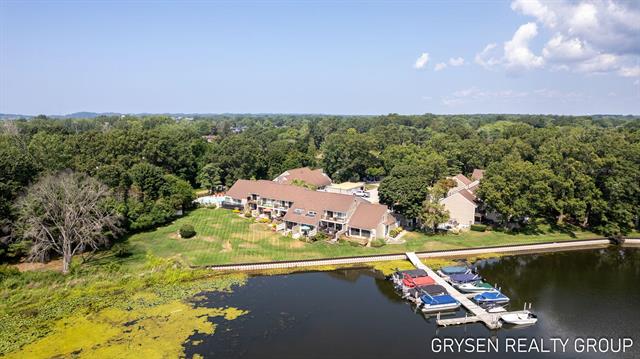 Builiding view forty for 566 Wind Drift, Spring Lake, MI. 49456