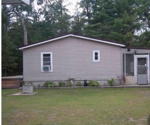 Builiding view three for 801 Rainbow Trail, Baldwin, MI. 49304