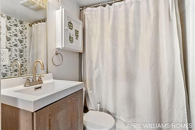 Builiding view eleven for 243 14Th, Holland, MI. 49423