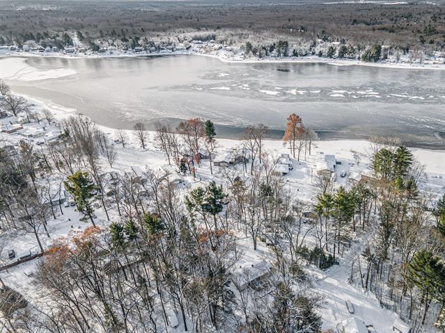 Builiding view eighteen for 2141 Maple, Twin Lake, MI. 49457