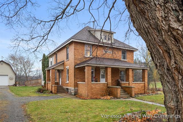 front view for 9566 Peach Ridgenw Avenue, Sparta, Mi. 49345