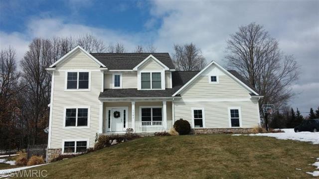 front view for 7787 Hunters Wayse Court, Ada, Mi. 49301