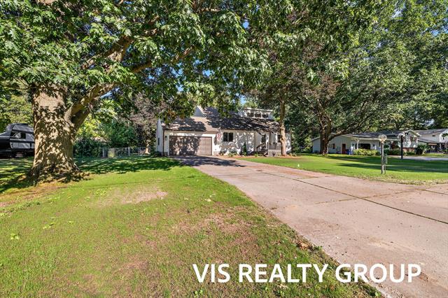 Builiding view sixty five for 18630 Fruitport, Spring Lake, MI. 49456