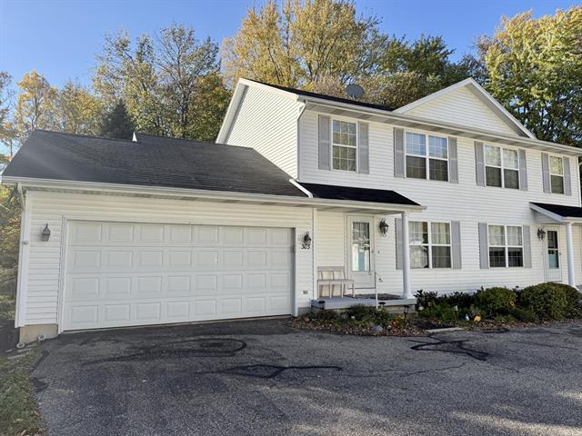 Builiding view one for 303 Wiley, Douglas, MI. 49406