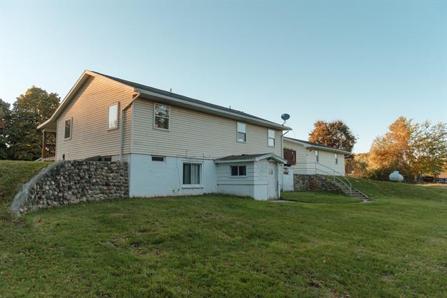 Builiding view five for 11300 Six Lakes, Six Lakes, MI. 48886