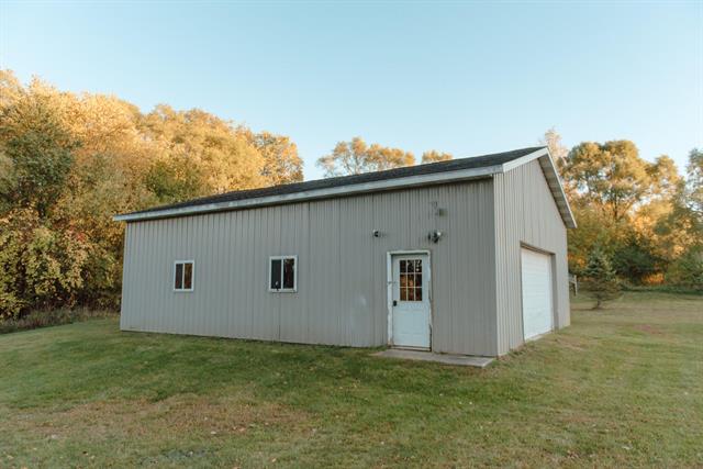 Builiding view six for 11300 Six Lakes, Six Lakes, MI. 48886