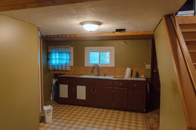 Builiding view twenty five for 11300 Six Lakes, Six Lakes, MI. 48886