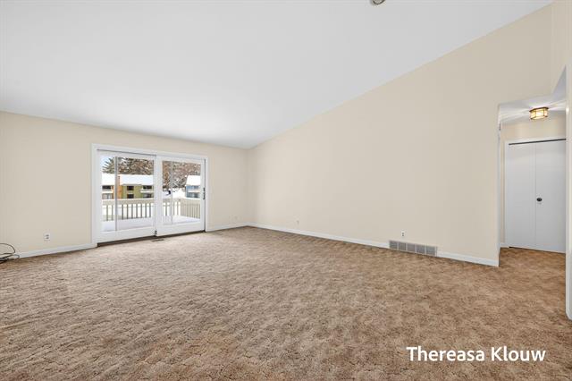 Builiding view eighteen for 17496 Meadow Wood, Spring Lake, MI. 49456