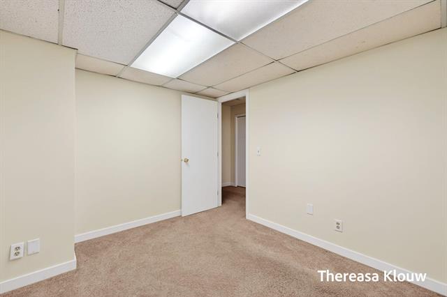 Builiding view forty four for 17496 Meadow Wood, Spring Lake, MI. 49456