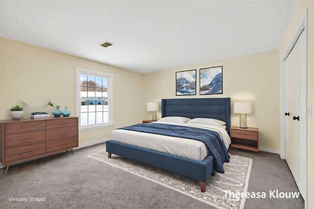 Builiding view forty one for 17496 Meadow Wood, Spring Lake, MI. 49456