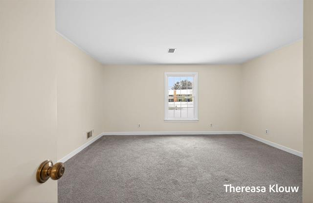 Builiding view forty two for 17496 Meadow Wood, Spring Lake, MI. 49456