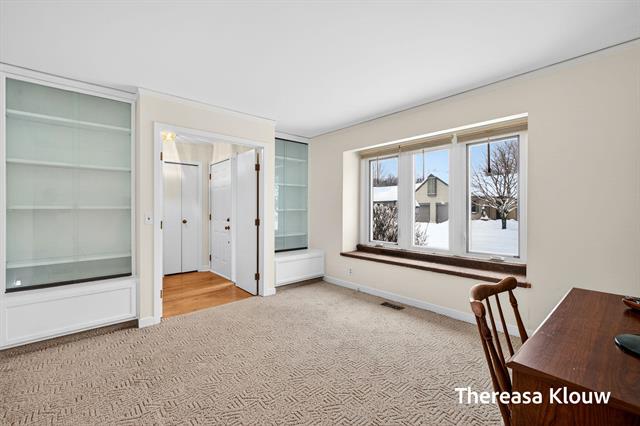 Builiding view nine for 17496 Meadow Wood, Spring Lake, MI. 49456