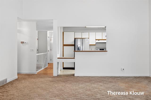 Builiding view nineteen for 17496 Meadow Wood, Spring Lake, MI. 49456