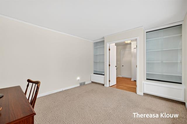 Builiding view ten for 17496 Meadow Wood, Spring Lake, MI. 49456