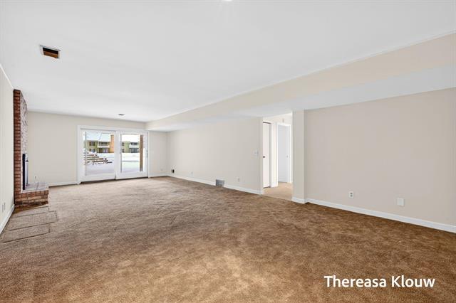 Builiding view thirty eight for 17496 Meadow Wood, Spring Lake, MI. 49456