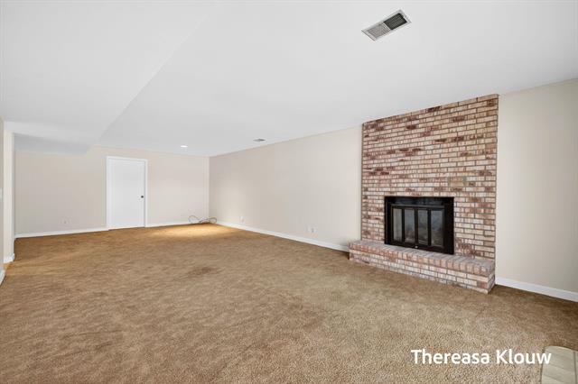 Builiding view thirty nine for 17496 Meadow Wood, Spring Lake, MI. 49456