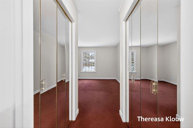 Builiding view thirty one for 17496 Meadow Wood, Spring Lake, MI. 49456