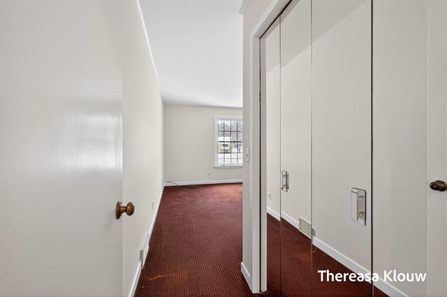 Builiding view thirty two for 17496 Meadow Wood, Spring Lake, MI. 49456