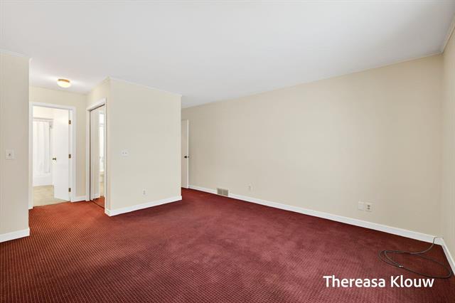 Builiding view thirty for 17496 Meadow Wood, Spring Lake, MI. 49456