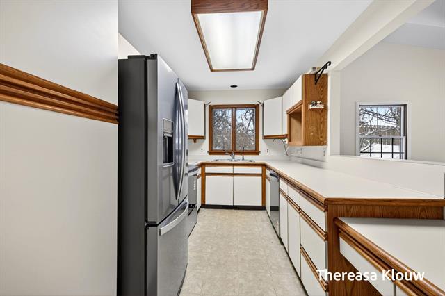 Builiding view twelve for 17496 Meadow Wood, Spring Lake, MI. 49456